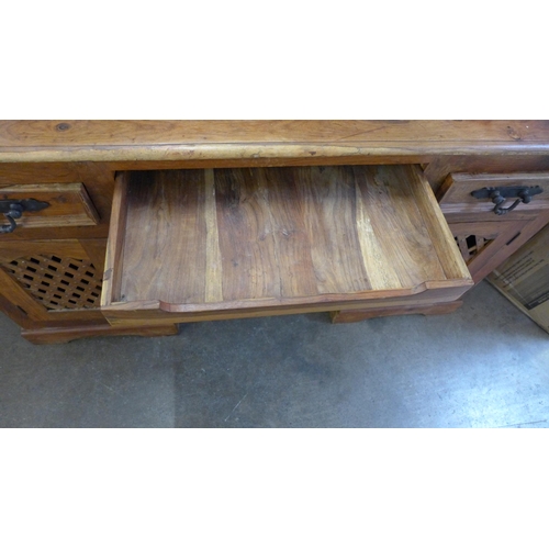 1577 - An Indian hardwood twin pedestal desk