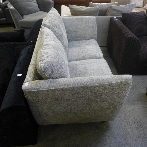 1997 - A champagne flecked textured weave two seater sofa