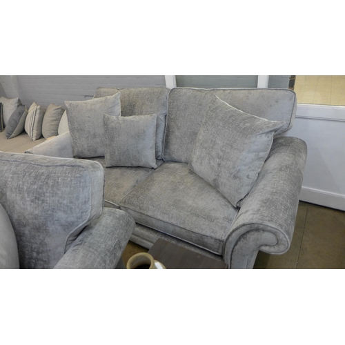 1322 - A pair of Mosta Adele steel upholstered sofas (3 + 2) * This lot is subject to VAT