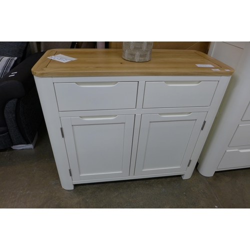 1365 - A Hove ivory painted and oak top two door, two drawer small sideboard * this lot is subject to VAT