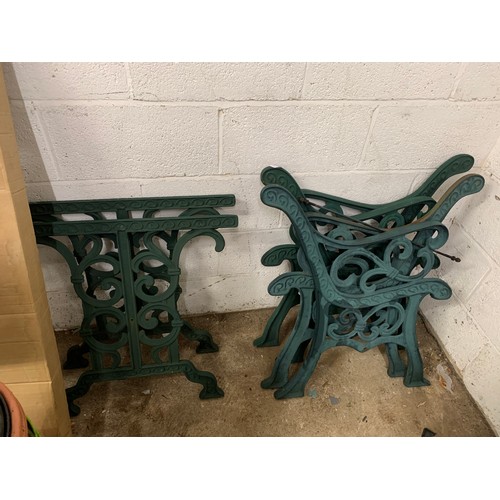 2141 - 3 sets of matching cast iron bench ends and a set of table legs with brackets