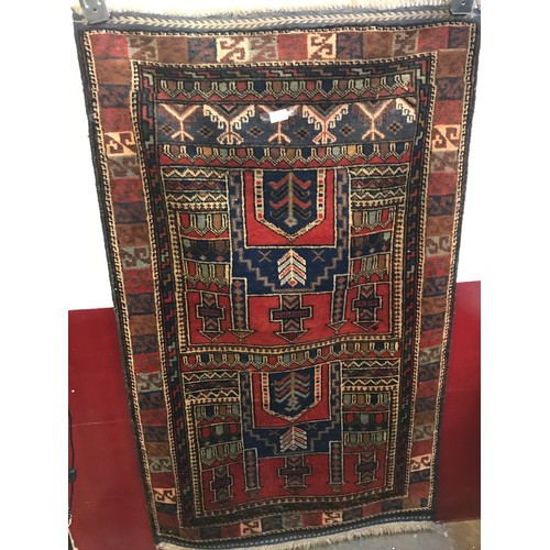 1420 - An Old Baluchi rug, 141cm x 87cm