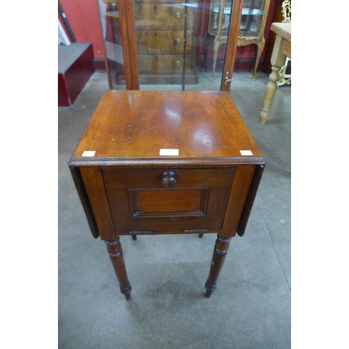 101 - A George IV mahogany drop-leaf night stand