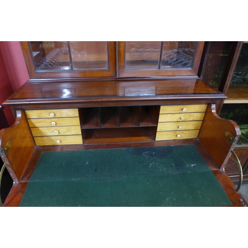 106 - A George IV mahogany secretaire bookcase, with Bramah locks, manner of Gillows, Lancaster, 200cms h,... 