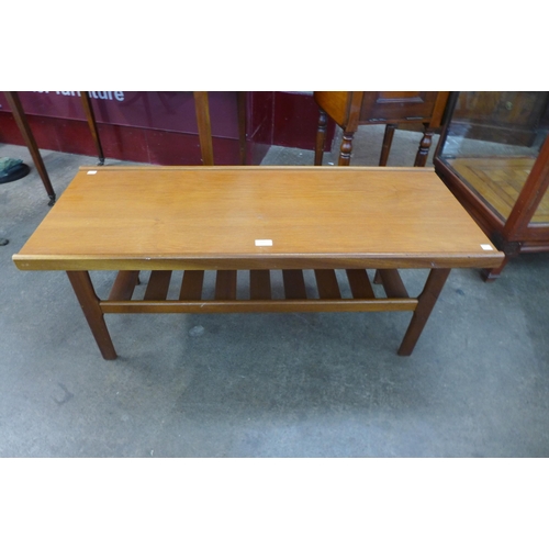 125 - A teak coffee table