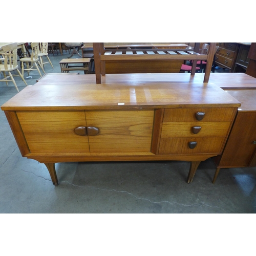 127 - A teak sideboard