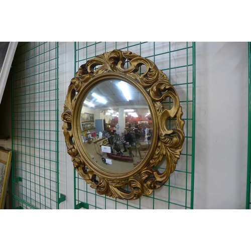 390 - A gilt framed convex mirror