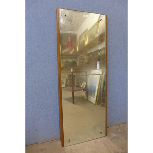 392 - A teak framed mirror