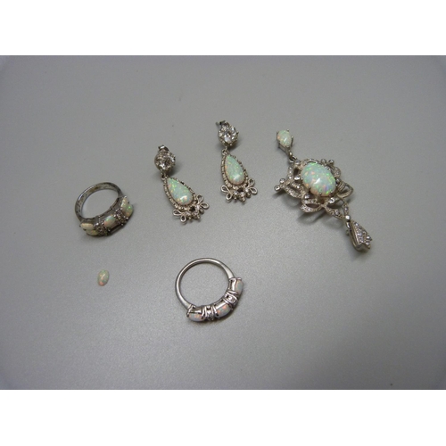 1028 - A collection of synthetic opal jewellery, one ring with loose stone