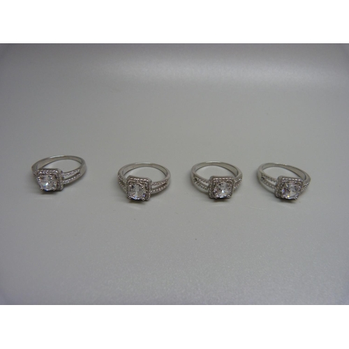 1032 - Four 925 sterling silver rings, sizes, L/M, (as new unworn)