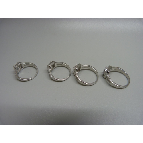 1032 - Four 925 sterling silver rings, sizes, L/M, (as new unworn)