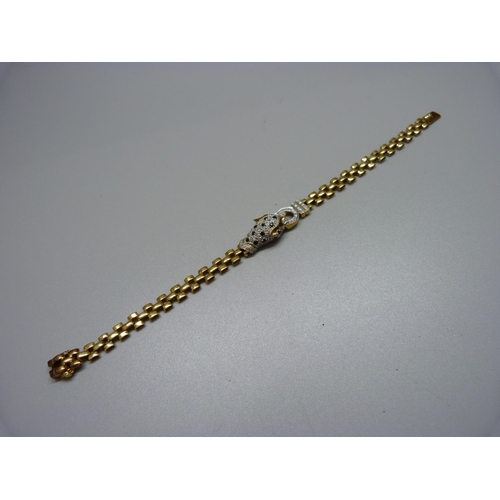 1040 - An 18ct gold, diamond and sapphire leopard bracelet, 15.5g, 182mm