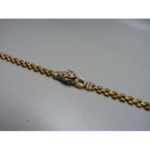 1040 - An 18ct gold, diamond and sapphire leopard bracelet, 15.5g, 182mm