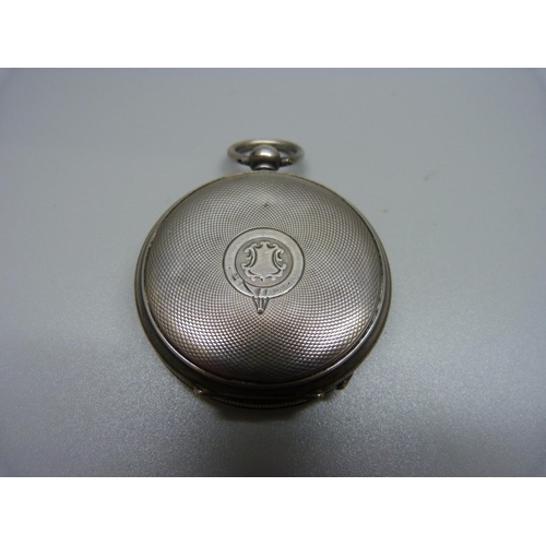 1046 - A silver cased chronograph pocket watch with key, Birmingham 1884