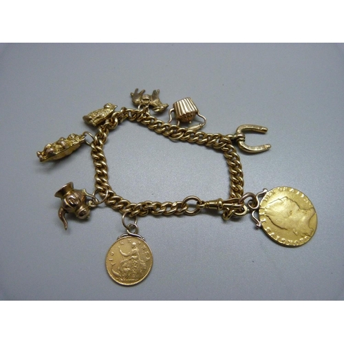 1078 - A 9ct gold bracelet with George III spade Guinea, an 1874 10 kroner coin, two 9ct gold charms and fo... 