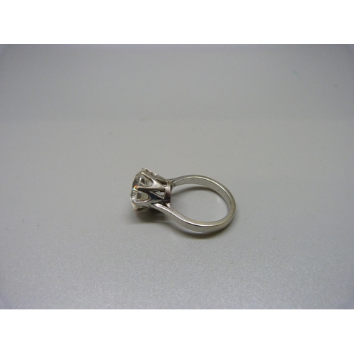 1099 - A large solitaire ring, set in white metal, N, approximately 12mm stone