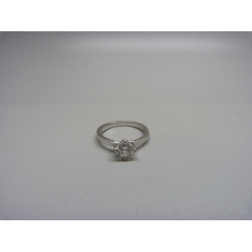 1105 - A platinum and diamond solitaire ring, 3.9g, L, approximately 0.75ct diamond weight