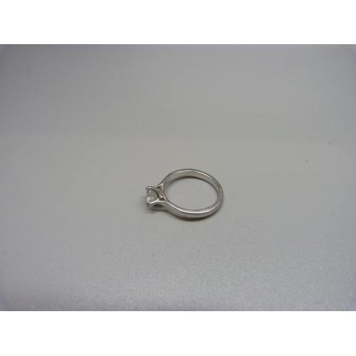 1105 - A platinum and diamond solitaire ring, 3.9g, L, approximately 0.75ct diamond weight