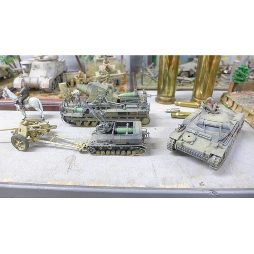 1128 - Four plastic model dioramas of WWII soldiers, five military vehicles, two brass shell cases and thre... 