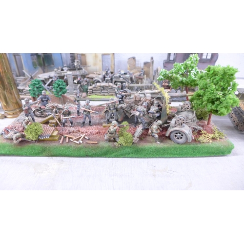 1128 - Four plastic model dioramas of WWII soldiers, five military vehicles, two brass shell cases and thre... 