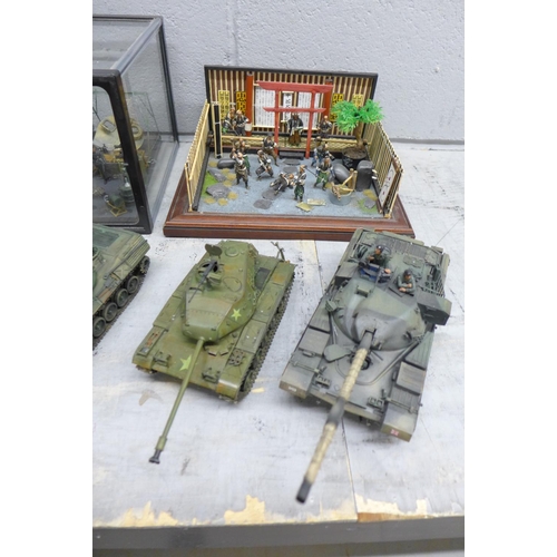 1131 - Three plastic model dioramas of WWII soldiers, (one cased plus one of Japanese Samurai) and five mil... 