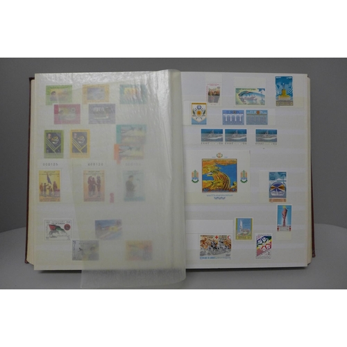 1137 - Stamps: a collection of mint stamps including sets, in 64 page stock book