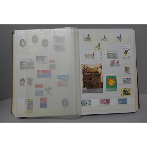 1137 - Stamps: a collection of mint stamps including sets, in 64 page stock book