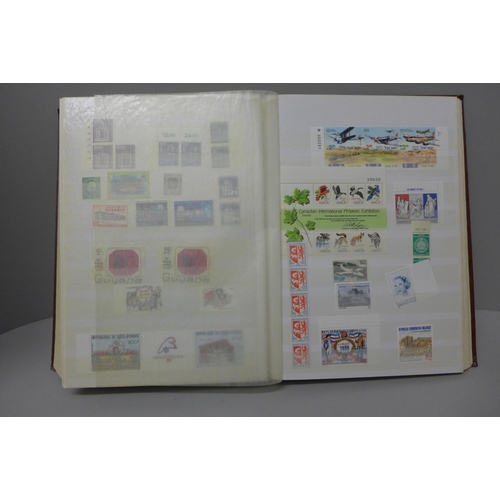 1137 - Stamps: a collection of mint stamps including sets, in 64 page stock book