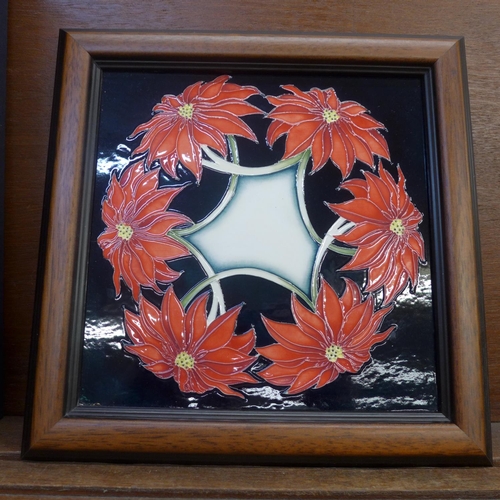 602 - A Moorcroft Poinsettia pattern trial plaque, dated 07/02/11, boxed, 20 x 20cm