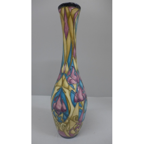 609 - A Moorcroft vase, marked Trial 13.3.06, 31cm