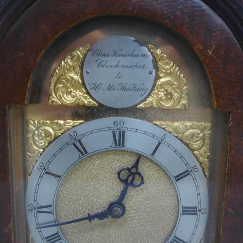 620 - A miniature walnut cased bracket clock, the arch to the dial inscribed Chas. Frodsham, Clockmaker to... 