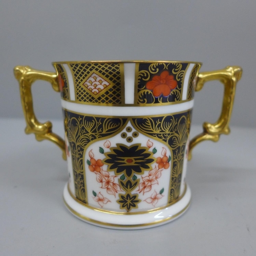 622 - A Royal Crown Derby 1128 pattern loving cup, 7.5cm, second