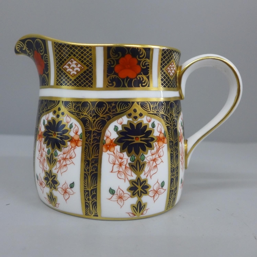 623 - A Royal Crown Derby 1128 pattern milk jug, 10cm, second