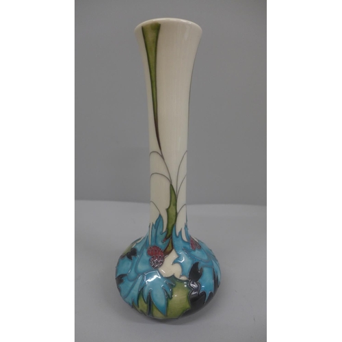 627 - A Moorcroft Sea Holly pattern vase, 2006, 21cm