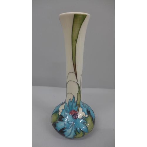 627 - A Moorcroft Sea Holly pattern vase, 2006, 21cm