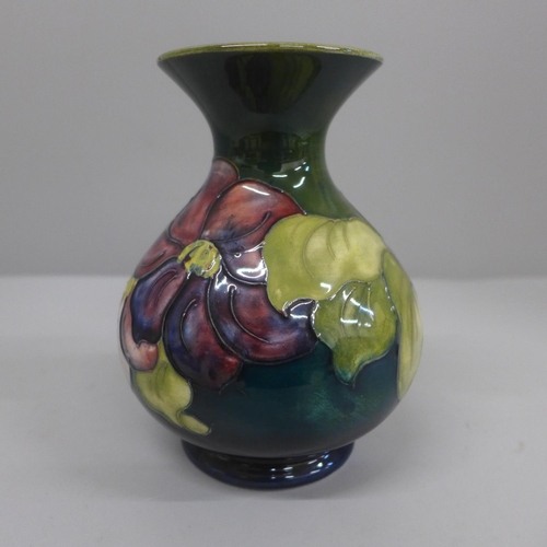 628 - A Moorcroft Clematis pattern vase, 13.5cm