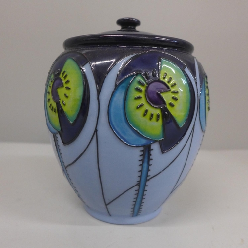 629 - A Moorcroft geometric pattern lidded jar, marked Trial 1.11.13, 15.5cm