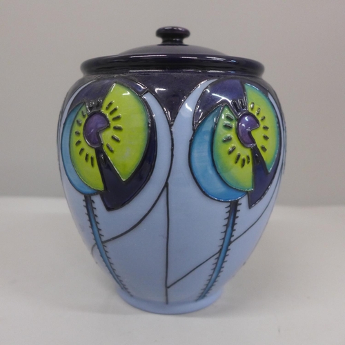 629 - A Moorcroft geometric pattern lidded jar, marked Trial 1.11.13, 15.5cm