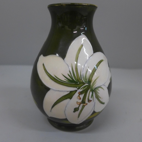 630 - A Moorcroft Bermuda Lily vase, 13.5cm