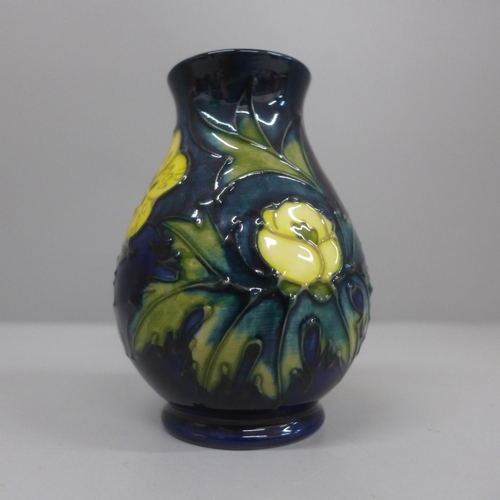 634 - A Moorcroft Buttercup pattern vase, 9.75cm