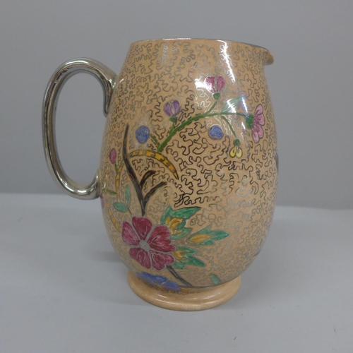 640 - A Moorcroft jug, 15.5cm