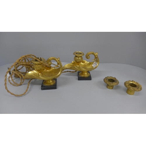 652 - A pair of gilt bronze ormolu chambersticks, converted to lamps