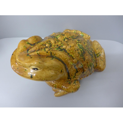 670 - A large ceramic model of a cane toad, 32cm, maker's mark to base