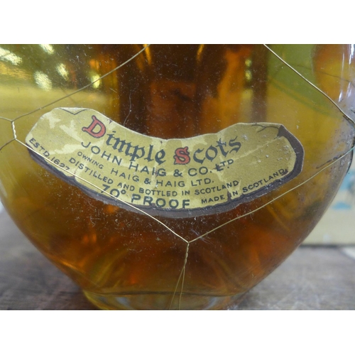 672 - A bottle of Haig's Dimple whisky, boxed