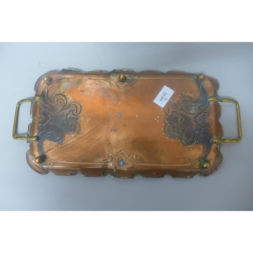 682 - A copper Art Nouveau two handled tray, 35.5cm