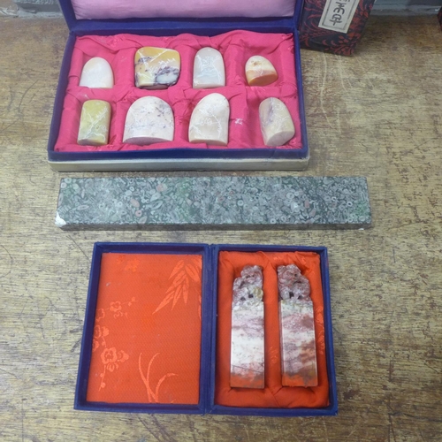 692 - Two cased sets of Chinese stone seals and a hardstone specimen