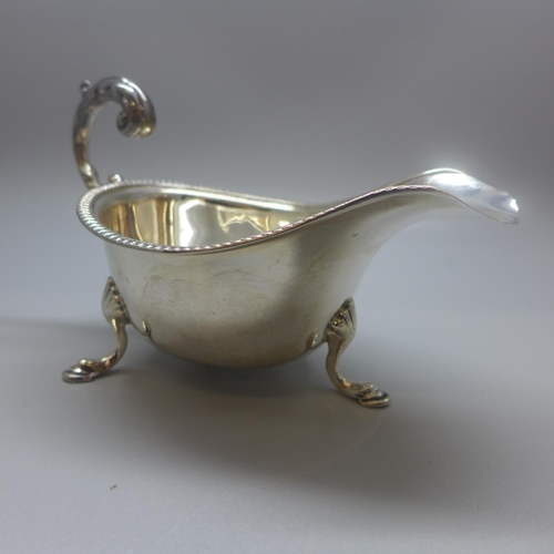 701 - A silver sauce boat, 83g, hallmark worn