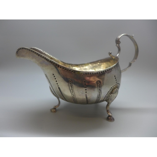 702 - An Irish silver sauce boat, repaired at the handle, 143g