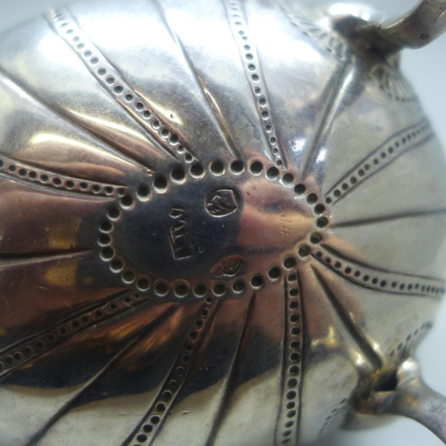 702 - An Irish silver sauce boat, repaired at the handle, 143g