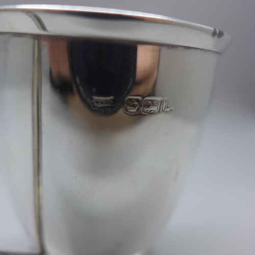 712 - A silver mug, Walker & Hall, with monogram dated 1953, 60g